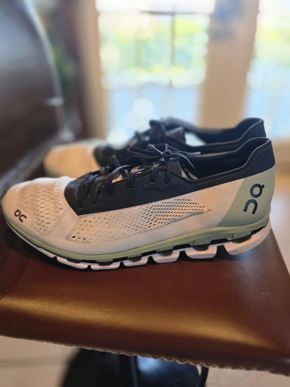 On Running Lightweight Men's Running Shoes in White and Black